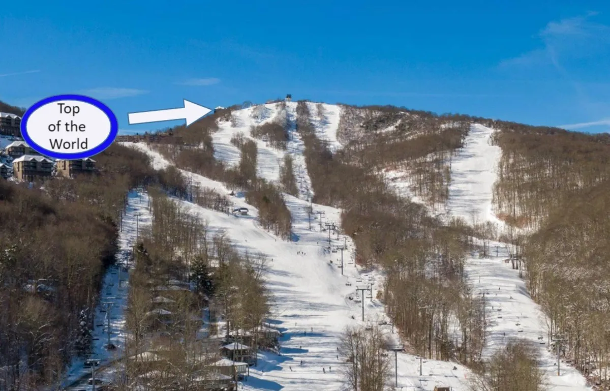 The image showcases a snow-covered mountainside condo perched at the summit of Sugar Mountain. In the foreground, ski lifts glide up the pristine slopes, and the distant peak frames a sunrise sky. The scene evokes both adventure and tranquility, with visible trails for skiing and snowboarding, and hints of nearby cozy lodges.